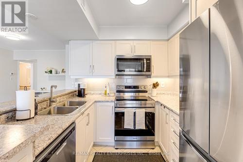 207 - 1725 Pure Springs Boulevard, Pickering, ON - Indoor Photo Showing Kitchen With Stainless Steel Kitchen With Double Sink