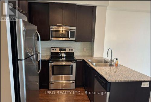 609 - 1328 Birchmount Road, Toronto, ON - Indoor Photo Showing Kitchen With Stainless Steel Kitchen With Double Sink With Upgraded Kitchen