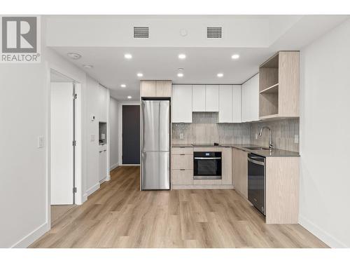 1488 Bertram Street Unit# 1103, Kelowna, BC - Indoor Photo Showing Kitchen With Stainless Steel Kitchen With Upgraded Kitchen