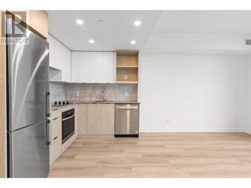 1488 Bertram Street Unit# 1103, Kelowna, BC - Indoor Photo Showing Kitchen With Stainless Steel Kitchen