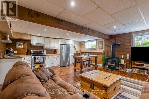 14308 County 27 Road, Springwater, ON - Indoor Photo Showing Living Room With Fireplace