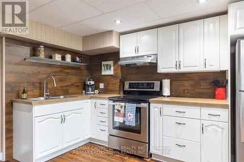 14308 County 27 Road, Springwater, ON - Indoor Photo Showing Kitchen With Double Sink