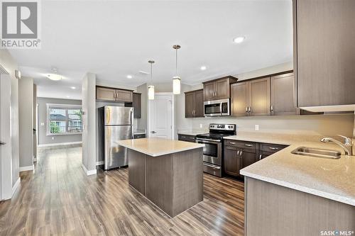 226 1220 Pringle Way, Saskatoon, SK - Indoor Photo Showing Kitchen With Double Sink With Upgraded Kitchen