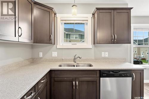 226 1220 Pringle Way, Saskatoon, SK - Indoor Photo Showing Kitchen With Double Sink