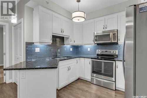 302 1025 Moss Avenue, Saskatoon, SK - Indoor Photo Showing Kitchen With Upgraded Kitchen