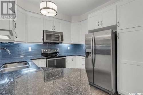 302 1025 Moss Avenue, Saskatoon, SK - Indoor Photo Showing Kitchen With Double Sink With Upgraded Kitchen