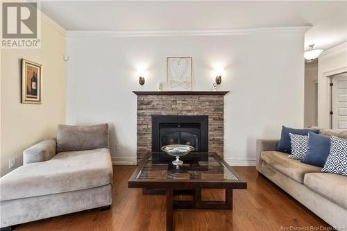 107 Rouse Street, Dieppe, NB - Indoor Photo Showing Living Room With Fireplace