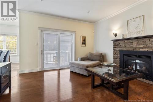 107 Rouse Street, Dieppe, NB - Indoor Photo Showing Living Room With Fireplace