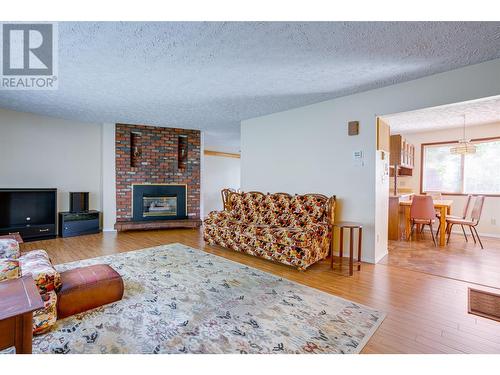 2281 Airport Way, Revelstoke, BC - Indoor Photo Showing Living Room With Fireplace