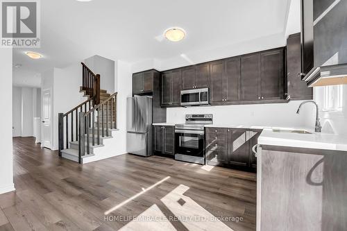 57 - 120 Court Drive, Brant, ON - Indoor Photo Showing Kitchen With Stainless Steel Kitchen With Upgraded Kitchen