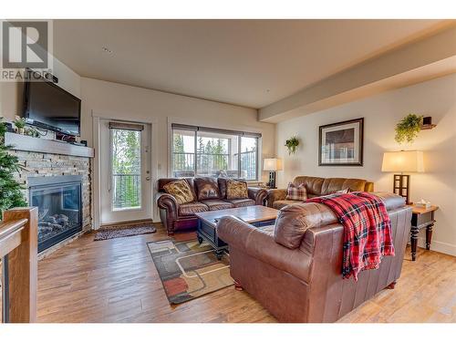 130 Arnica Lane, Vernon, BC - Indoor Photo Showing Living Room With Fireplace