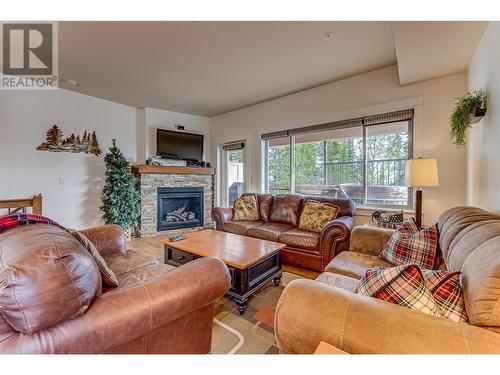 130 Arnica Lane, Vernon, BC - Indoor Photo Showing Living Room With Fireplace