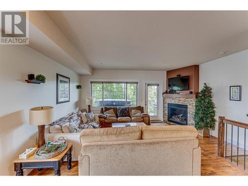 130 Arnica Lane, Vernon, BC - Indoor Photo Showing Living Room With Fireplace