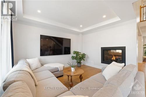 1299 Diamond Street, Clarence-Rockland, ON - Indoor Photo Showing Living Room With Fireplace