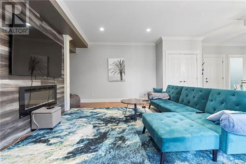 41 Desrosiers Street, Dieppe, NB - Indoor Photo Showing Living Room With Fireplace