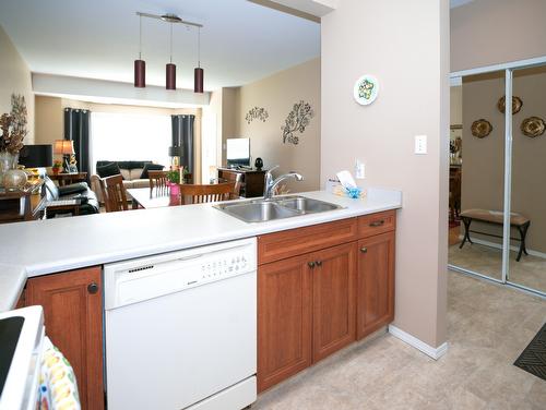 104-3805 30 Avenue, Vernon, BC - Indoor Photo Showing Kitchen With Double Sink