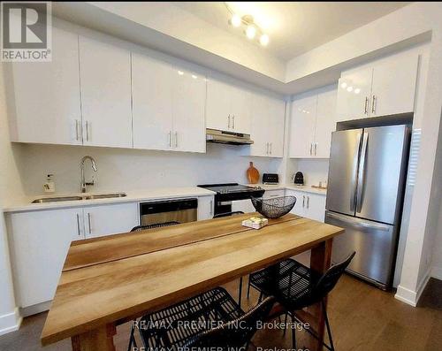 L106 - 9560 Islington Avenue, Vaughan, ON - Indoor Photo Showing Kitchen With Double Sink