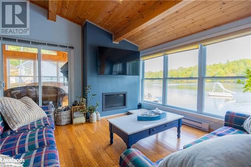 317 Haskett'S Drive, Georgian Bay, ON - Indoor Photo Showing Living Room With Fireplace