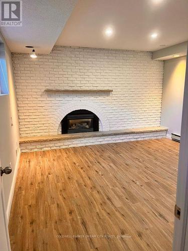 7061 Sauterne(Bsmt) Place, Niagara Falls, ON - Indoor With Fireplace