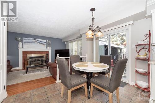 32 Ellisson Way, Ottawa, ON - Indoor Photo Showing Dining Room With Fireplace