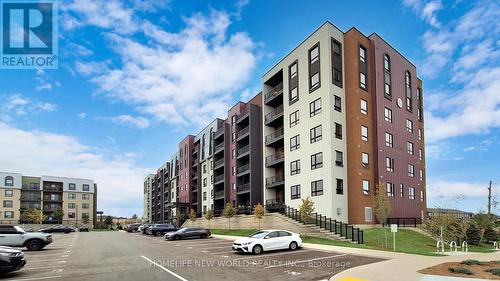 512 - 4 Spice Way, Barrie, ON - Outdoor With Balcony With Facade