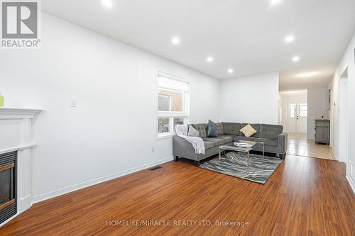 221 High Street, Clarington, ON - Indoor Photo Showing Living Room With Fireplace