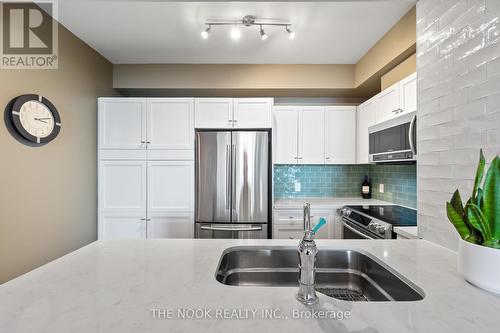 1101 - 1359 Rathburn Road E, Mississauga (Rathwood), ON - Indoor Photo Showing Kitchen With Double Sink