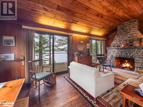 53 Birdwood Drive, Mcdougall, ON - Indoor Photo Showing Living Room With Fireplace