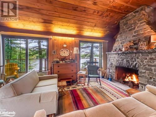 53 Birdwood Drive, Mcdougall, ON - Indoor Photo Showing Living Room With Fireplace