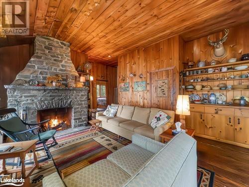 53 Birdwood Drive, Mcdougall, ON - Indoor Photo Showing Living Room With Fireplace