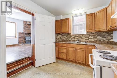 18 Fairholt Road N, Hamilton, ON - Indoor Photo Showing Kitchen With Double Sink