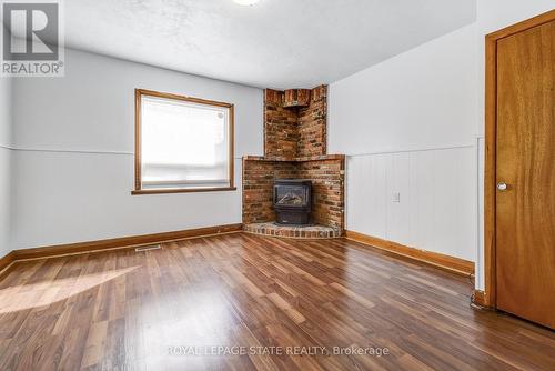 18 Fairholt Road N, Hamilton, ON - Indoor Photo Showing Living Room With Fireplace