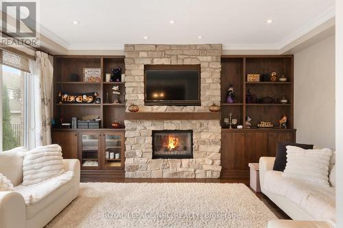 8829 Joseph Court, Niagara Falls, ON - Indoor Photo Showing Living Room With Fireplace