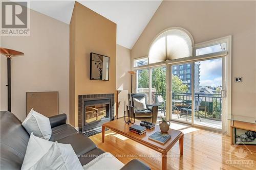 302 - 400 Mcleod Street, Ottawa, ON - Indoor Photo Showing Living Room With Fireplace