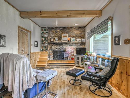 Salon - 730  - 736 Rue Dion, Sainte-Adèle, QC - Indoor With Fireplace