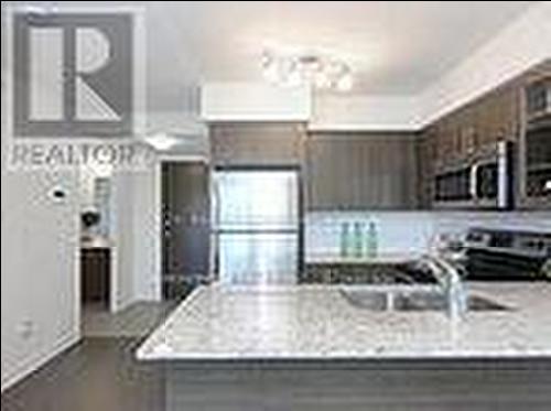 415 - 75 Norman Bethune Avenue, Richmond Hill, ON - Indoor Photo Showing Kitchen With Upgraded Kitchen