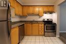 100 - 833 Scollard Court, Mississauga, ON  - Indoor Photo Showing Kitchen 