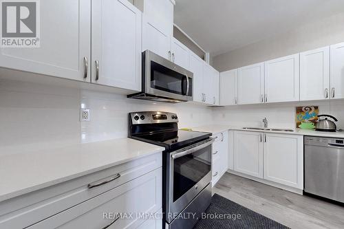 1001 - 44 Bond Street W, Oshawa, ON - Indoor Photo Showing Kitchen With Stainless Steel Kitchen With Double Sink