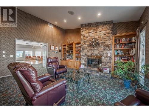 Library - 595 Yates Road Unit# 34 Lot# 76, Kelowna, BC - Indoor With Fireplace