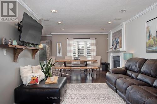 90 Oliver Crescent, Zorra, ON - Indoor Photo Showing Living Room With Fireplace