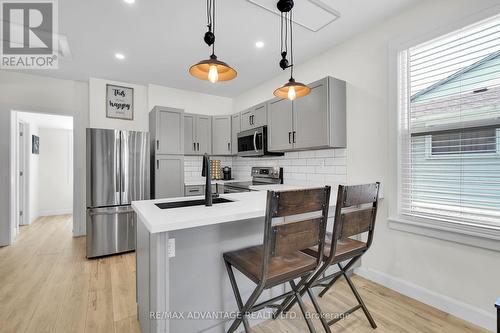 49 Briscoe Street W, London, ON - Indoor Photo Showing Kitchen With Double Sink With Upgraded Kitchen