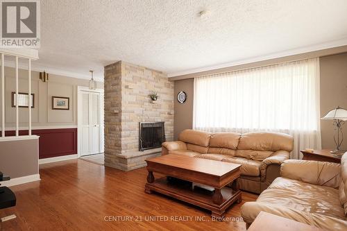 784 Norwood Terrace, Peterborough (Monaghan), ON - Indoor Photo Showing Living Room With Fireplace