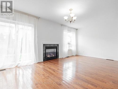 Main&2 - 3067 Cabano Crescent S, Mississauga, ON - Indoor Photo Showing Living Room With Fireplace