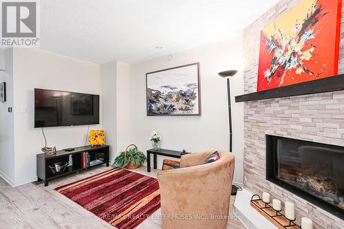 47 - 146 Settlers Way, Blue Mountains, ON - Indoor Photo Showing Living Room With Fireplace