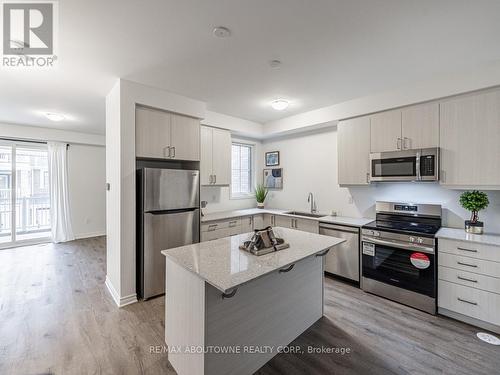 48 - 1317 Leriche Way, Milton, ON - Indoor Photo Showing Kitchen With Stainless Steel Kitchen