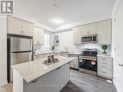 48 - 1317 Leriche Way, Milton, ON - Indoor Photo Showing Kitchen With Stainless Steel Kitchen