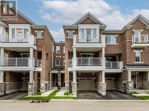 48 - 1317 Leriche Way, Milton, ON - Outdoor With Facade