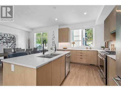 1455 Cara Glen Court Unit# 113, Kelowna, BC - Indoor Photo Showing Kitchen With Double Sink With Upgraded Kitchen