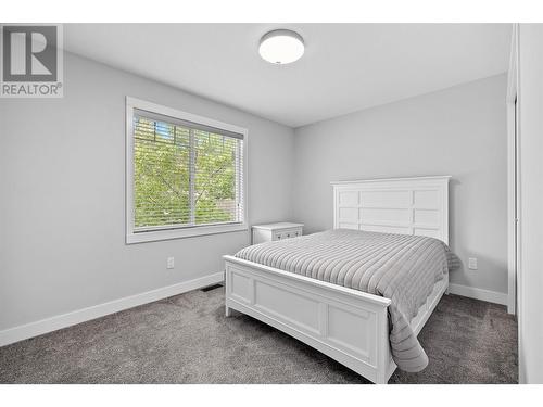 3075 Vint Road Unit# 101, Kelowna, BC - Indoor Photo Showing Bedroom