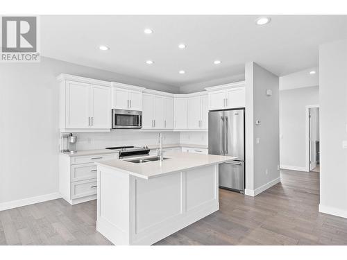 3075 Vint Road Unit# 101, Kelowna, BC - Indoor Photo Showing Kitchen With Double Sink